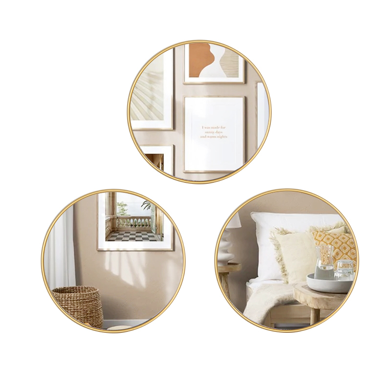 The "Gold Round Mirror Trio: Elegant Wall Decor Set" is a captivating ensemble of three round mirrors, each encased in a luxurious gold-toned plastic frame. Designed to enhance the ambiance of your bathroom or bedroom, these mirrors effortlessly combine functionality and aesthetic appeal. The reflective surfaces not only serve their practical purpose but also contribute to the illusion of space and light in the room. The warm, golden frames add a touch of opulence and sophistication to any interior, elevating the overall decor. With their versatile design, these mirrors seamlessly integrate into various styles and settings, making them a perfect choice for those seeking a blend of modern elegance and timeless charm in their living spaces.